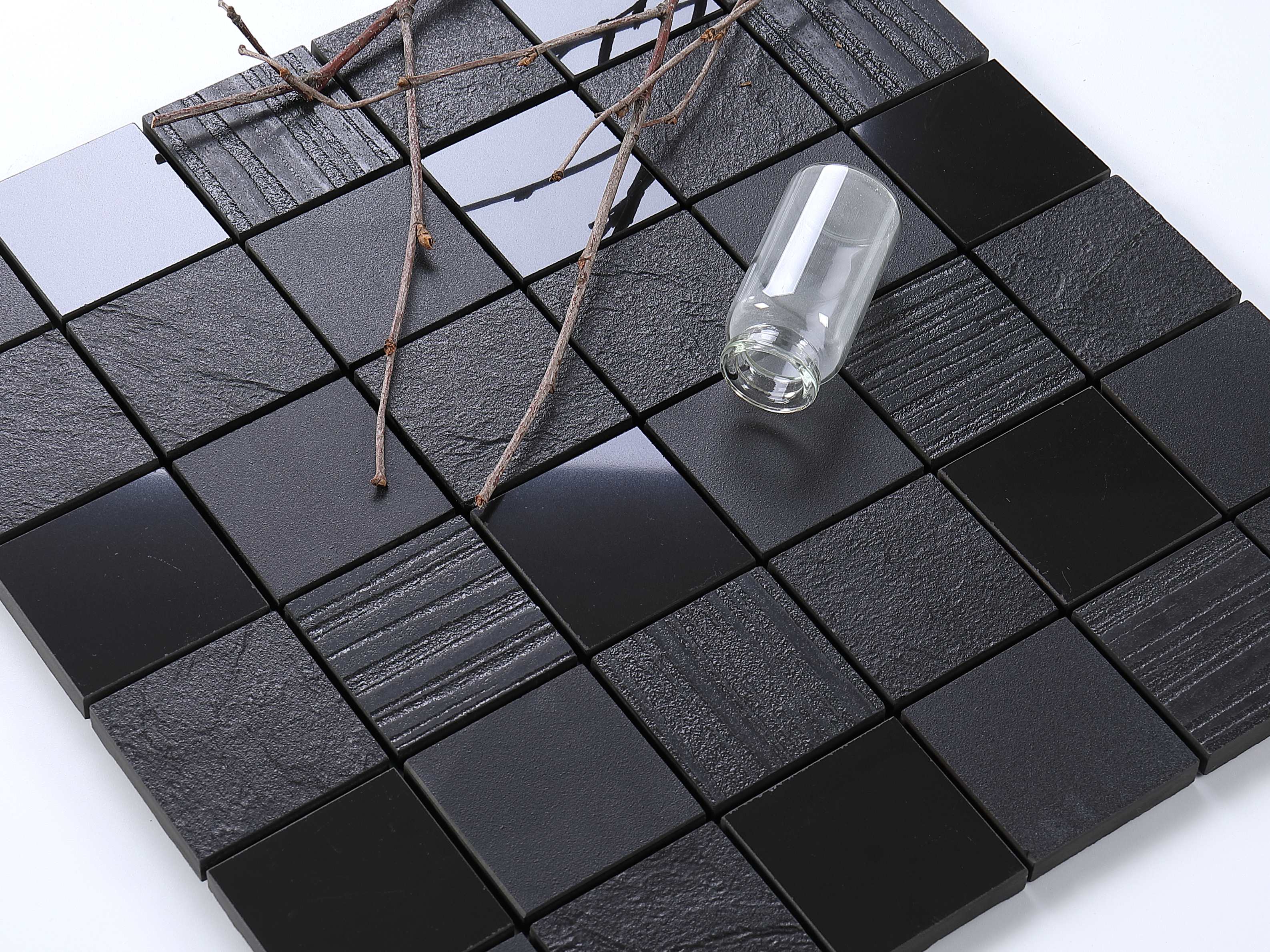 bathroom black mosaic tiles